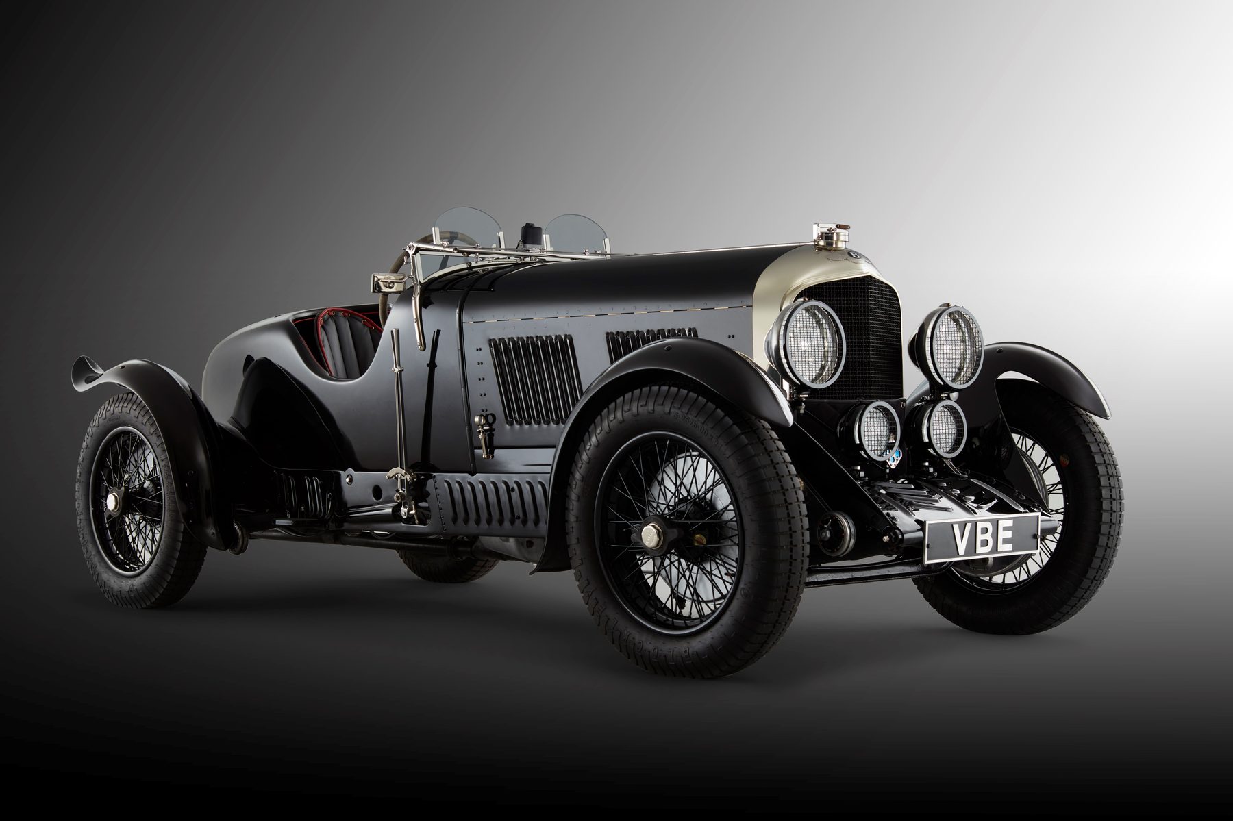 Front three-quarter view of Petronella with nickel radiator shell and mesh-guarded lamps