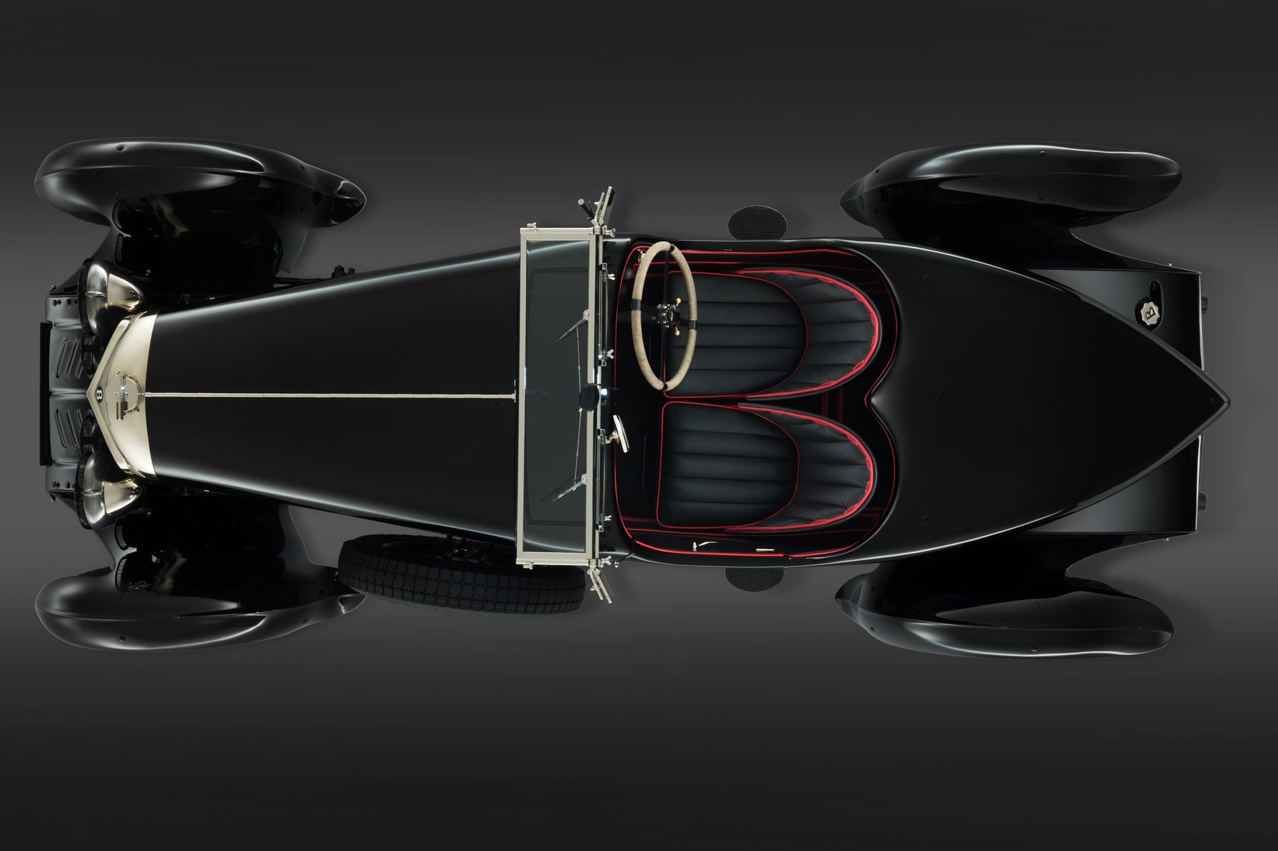 Overhead view of Petronella showing the boat-tail body and black leather seats with red piping