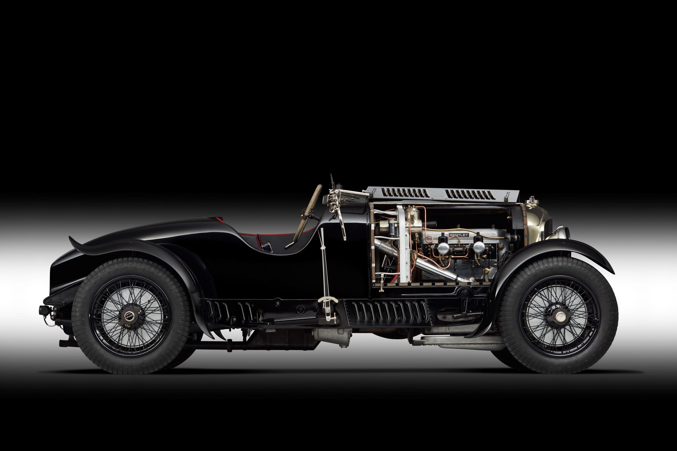 Side profile of Petronella with the bonnet removed, exposing the full engine